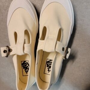 Vans Cream Canvas Slip-On Sneakers